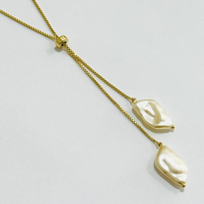 GRAVATA PÉROLAS BARROCAS